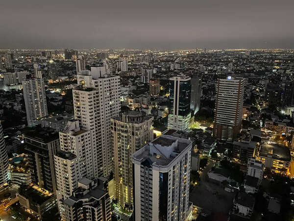 Bangkok, Thailand - December 10, 2019: Bangkok cityscape at night, view from Marriott rooftop bar at sukhumvit Soi 57