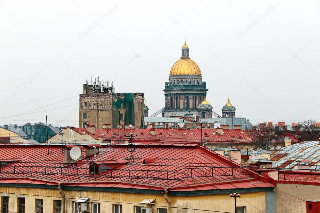 Panorama of the red roofs of St. Petersburg and St. Isaacs Cath