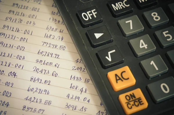 Numbers and financial calculator — Stock Photo, Image