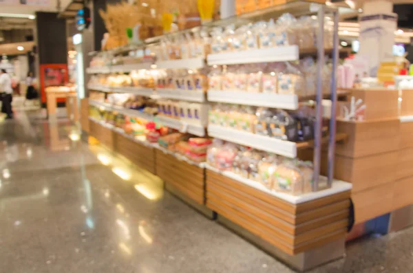 Blurred bread shelves — Stock Photo, Image