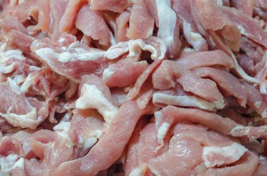 Taze domuz dilimler halinde arka plan görüntüsü olarak kesin..