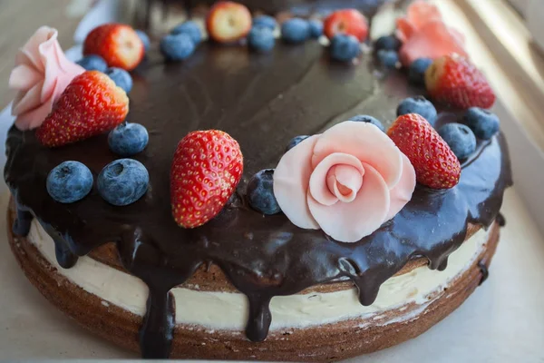 Chocolate berry cake with  flower