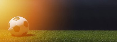 ot siyah arka plan üzerinde futbol topu