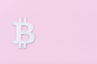 Pembe arkaplanda Bitcoin İşaret Şekli