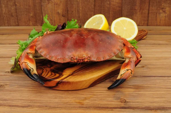 Whole Fresh Cooked Brown Crab Wooden Background Lemon Salad Leaves — Stock Photo, Image