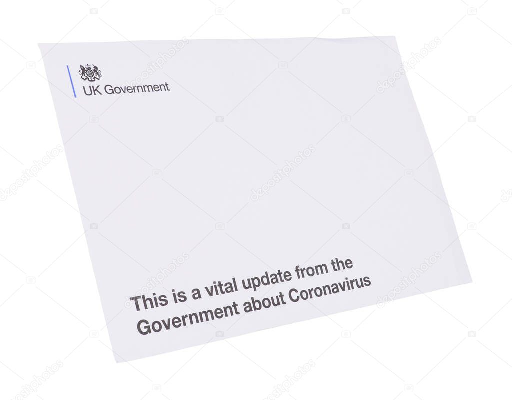 Letter envelope from United Kingdom Government to every household in UK with vital updates about Coronavirus and lock down rules, isolated on a white background