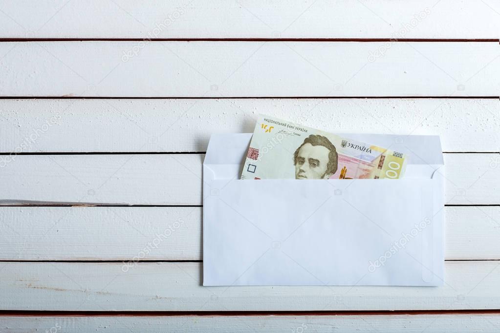 Cash in an envelope ukrainian hryvnia.