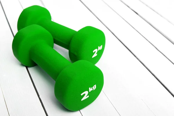 Color dumbbells weight for fitness. — Stock Photo, Image