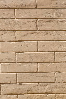 Doku kahverengi tuğla duvar.