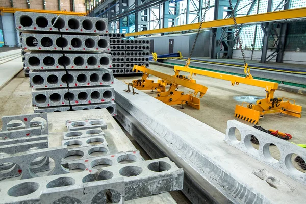 Stock image new hollow core slabs cut into pieces and folded at the warehouse of a plant for the production of building materials.