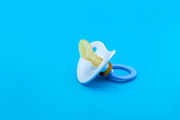 Blue Pacifier Made Soft Silicone Isolated Blue Background Side View — Stock Photo, Image