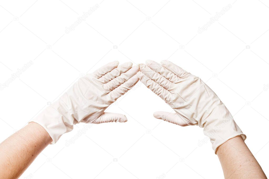 two hands in a medical sterile gloves shows palms in front of you, concept mock up isolated on white background with copy space.