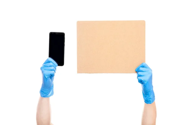 Χέρια Αποστειρωμένα Ιατρικά Γάντια Κατέχουν Χαρτί Από Χαρτόνι Και Διαμαρτυρία — Φωτογραφία Αρχείου