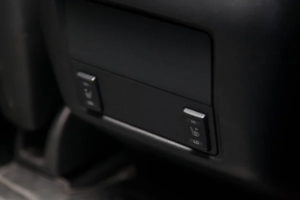 Control switch heated two rear seats on the car dashboard with p — Stock Photo, Image