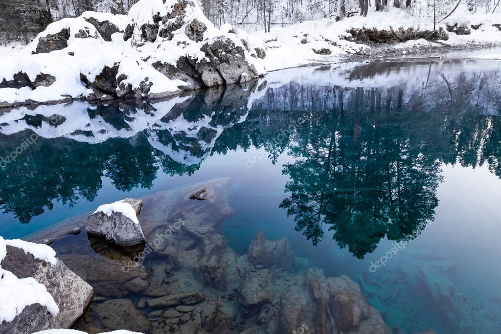 Landmark in the mountains of Altai, blue lakes non-freezing in w