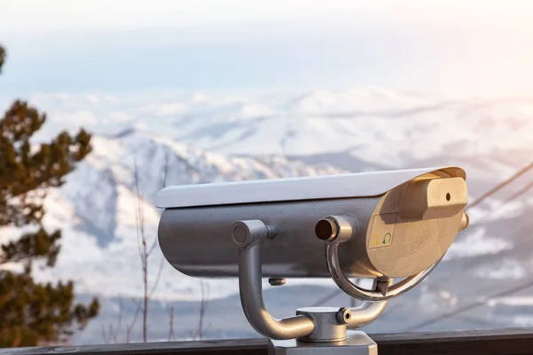 Stationary binoculars on the observation deck in the Altai mount