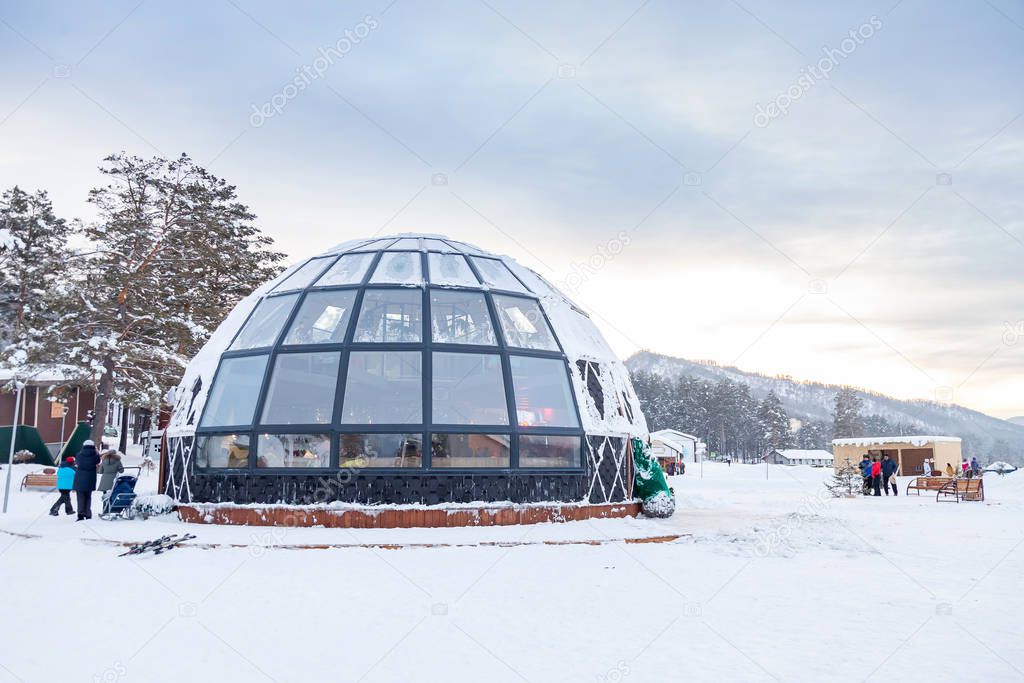 A beautiful cafe in the form of a hemisphere or a dome of glass 