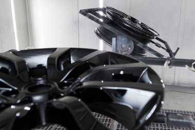 A Two black painted aluminum alloy wheel is mounted on a special