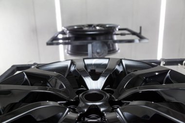 A Two black painted aluminum alloy wheel is mounted on a special