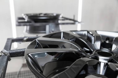 A Two black painted aluminum alloy wheel is mounted on a special