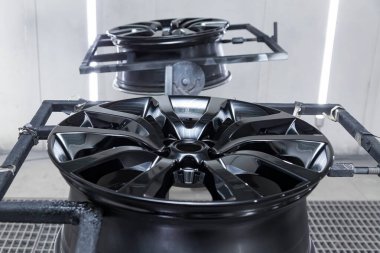 A Two black painted aluminum alloy wheel is mounted on a special