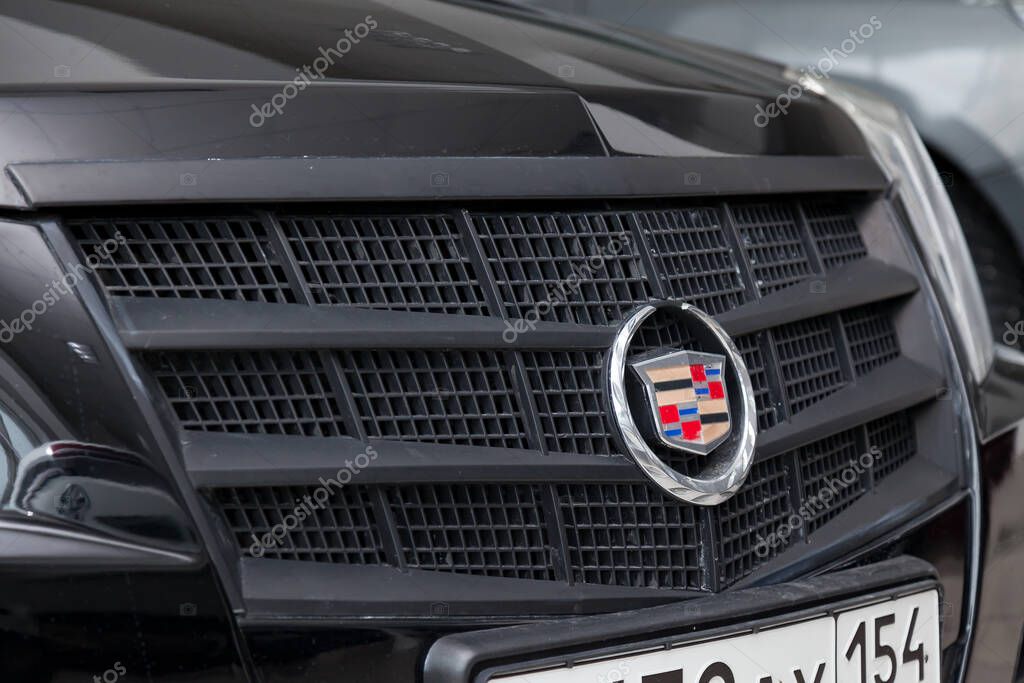 Novosibirsk, Russia - 08.01.2018: Emblem of Cadillac CTS in black color after cleaning before sale