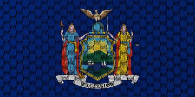 ABD ulusal bayrağı, bağımsızlık gününde mavi ve sarı farklı renklerde dikişli gri bir tekstil kumaşına karşı New York 'u temsil ediyor. Kıyafet ve endüstri.