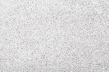 Gri arkaplan, oval ve yuvarlak polistiren desenli deniz çakıl taşlarına benzer, kırılgan kısımları yakın planda tutmak ya da budamak için kullanılıyor. Tasarım paneli ya da yapı malzemesi.