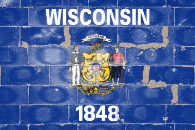 Wisconsin eyaleti ulusal bayrağını mavi çatlamış tuğla duvarda Bağımsızlık Günü 'nde sokak graffitisi şeklinde. Siyasi ve dini anlaşmazlıklar, gelenekler ve teslimat.