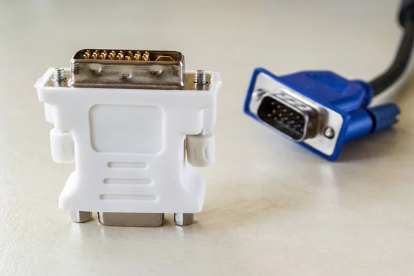 White adapter for connecting dvi-d and vga and blue monitor cord — ストック写真