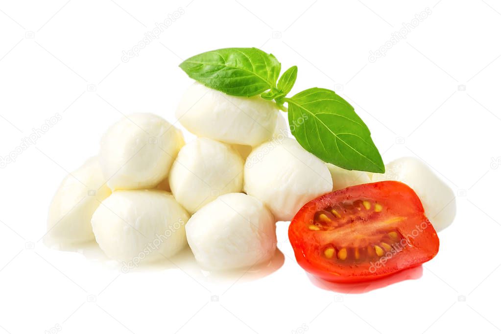 Heap of mini mozzarella cheese, basil and cherry tomato isolated