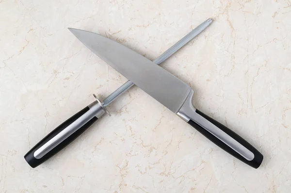 Professional Chef Knife Sharpening Steel Lying Crosswise Kitchen Table Modern — Stock Photo, Image
