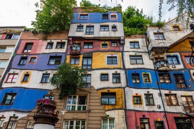 VIENNA, AUSTRIA - JULY 28, 2019:  Hundertwasserhaus is an apartment house in Vienna, Austria, built after the idea and concept of Austrian artist Friedensreich Hundertwasser