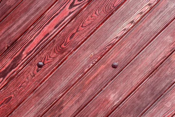 La vieille texture de bois rouge avec des motifs naturels — Photo