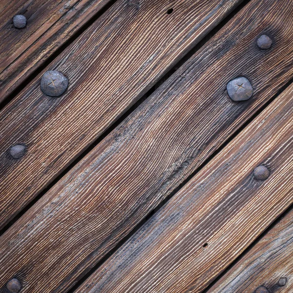 La vecchia struttura in legno con motivi naturali — Foto Stock