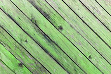 Doğal desenli eski yeşil ahşap doku.