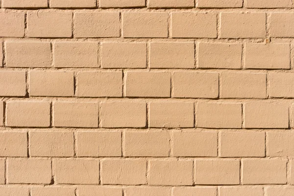 Textura de fundo de uma parede de tijolo pintado velho — Fotografia de Stock