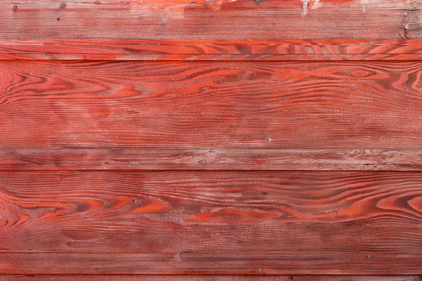 La vieille texture de bois rouge avec des motifs naturels — Photo