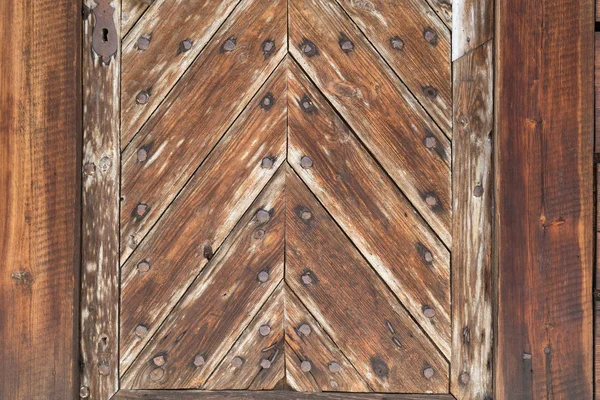A régi, fából készült ajtó. Háttér — Stock Fotó