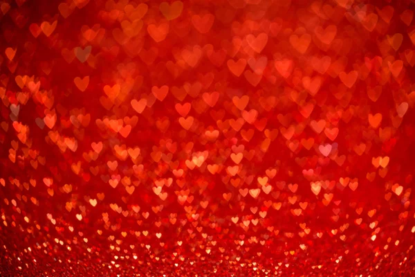 Rood hart bokeh achtergrond. De dag van Valentijnskaarten textuur. — Stockfoto