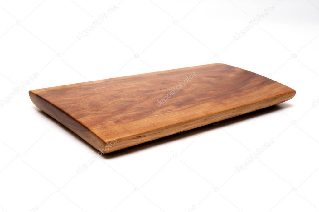 Isolated cutting board for use as a background.