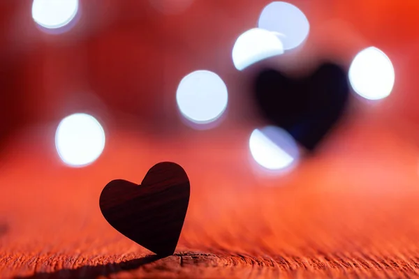 Wooden heart and blurry background. — Stockfoto