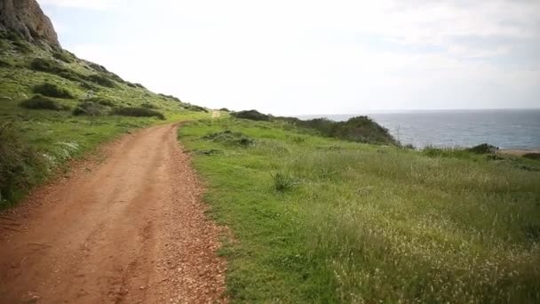 Beautiful valley by the sea. Trail leading along the coast. Seascape in Cyprus Ayia Napa — Stock Video