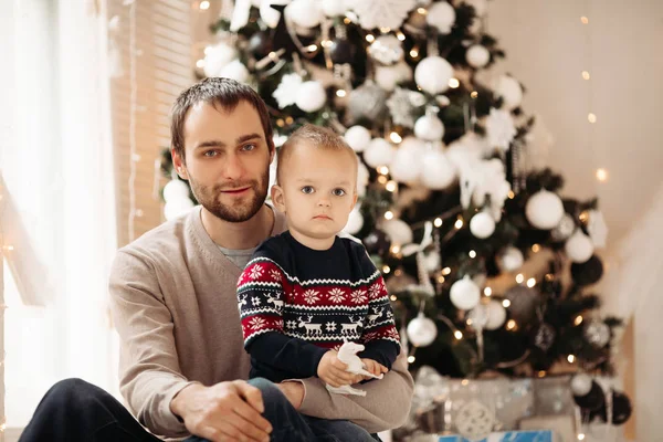 Loving father packing Christmas present with son. — Stok Foto