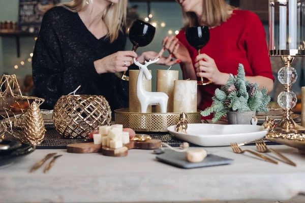 Happy female friends celebrating Christmas or New Year eve party — Stock Photo, Image