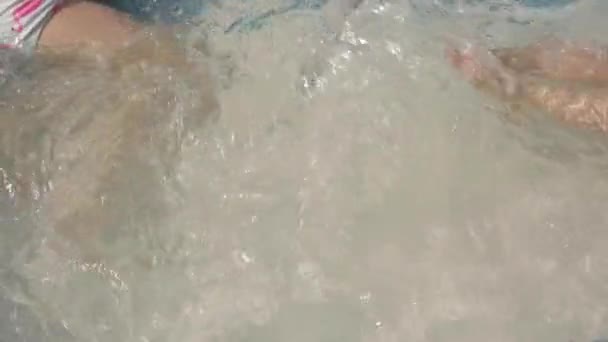 Wavy water in outdoors pool. — Wideo stockowe