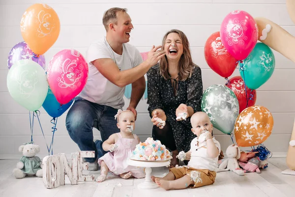 Happy family having fun get dirty cake cream on face celebrating children happy birthday — 스톡 사진