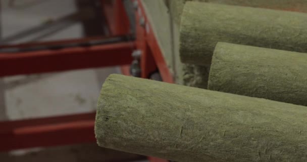 Worker measuring the heat-insulating for pipes. — Stock Video