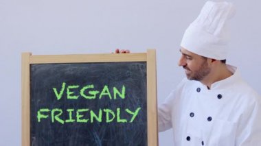 Şef atış Vegan samimi işareti ile