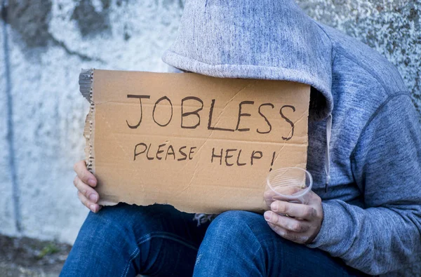 Jobless man begging on a street — Stock Photo, Image